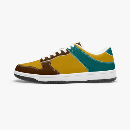 Unique retro color inspired low top leather sneakers. Crafted with premium leather, these sneakers feature teal, yellow and brown color ways for a playful look. Versatile and durable. Shop now for a bold fashion statement!